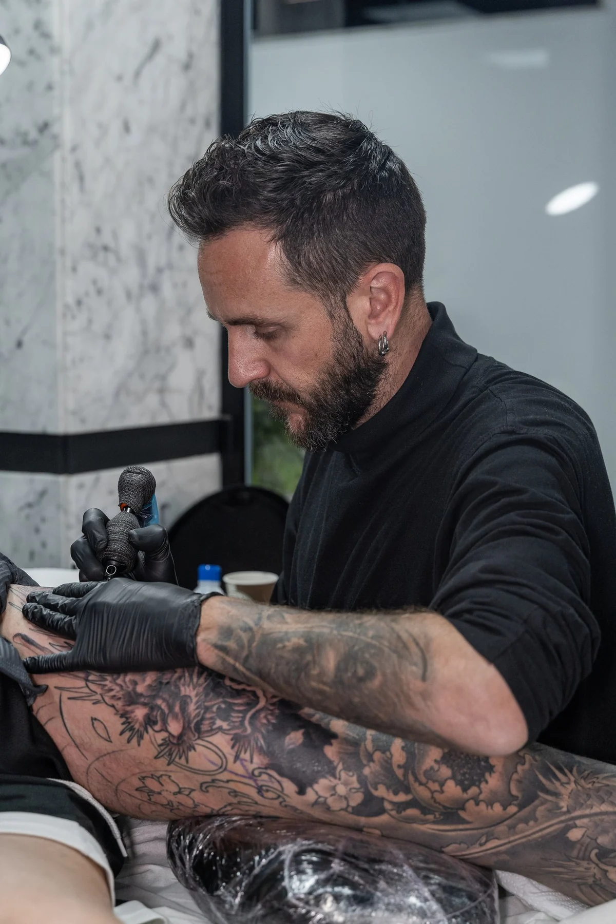 Diego Ruiz, tattoo artist en The Club Tattoo & Barber